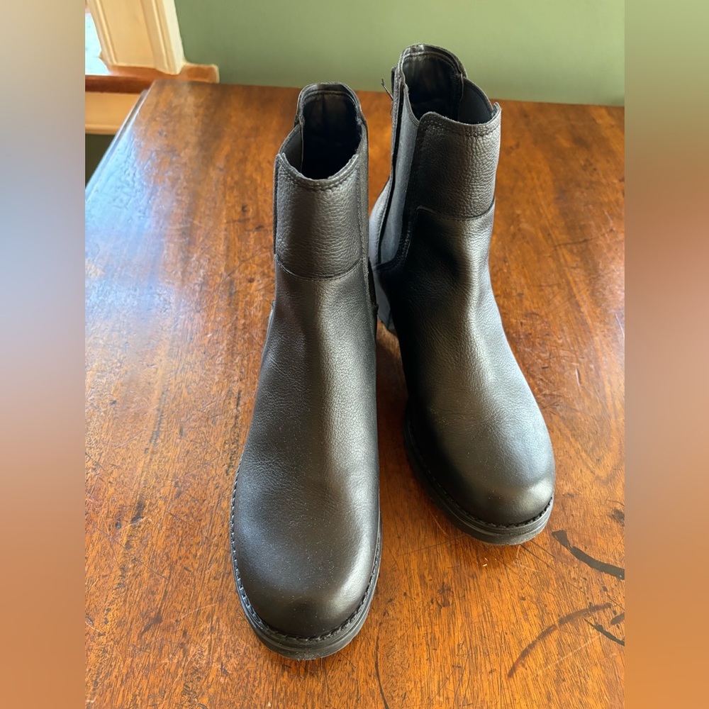 Black Cole Haan boots. Unworn. Waterproof and genuine leather.